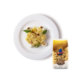 Conchiglie con crema di ricotta, rucola e mandorle